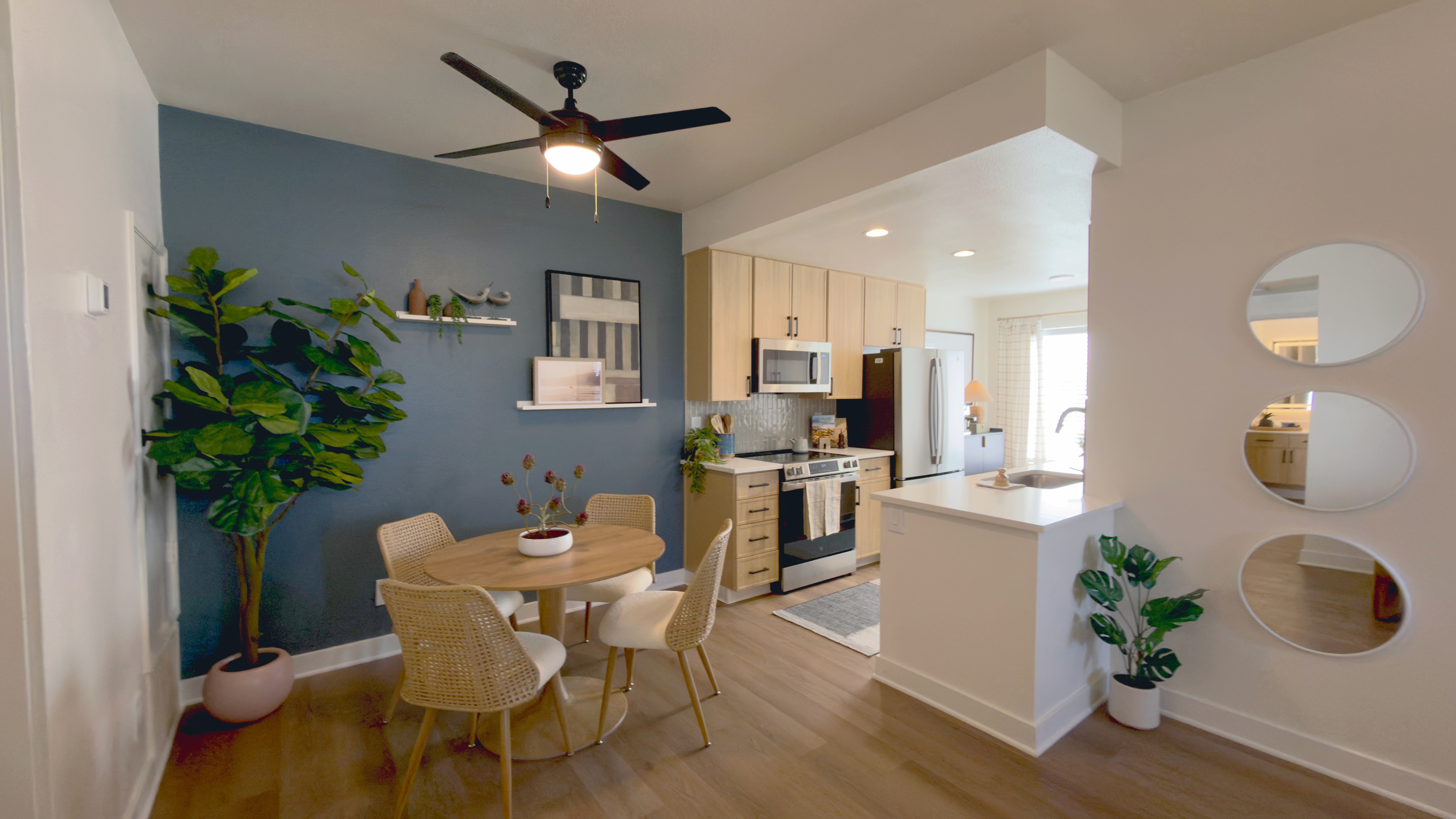Dining room and ceiling fan at The Resort at Encinitas Apartments in Encinitas CA